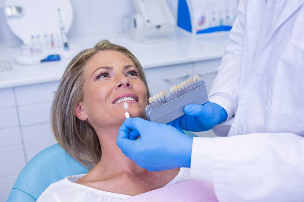 Patient smiling after teeth whitening at Family Dentistry Naples